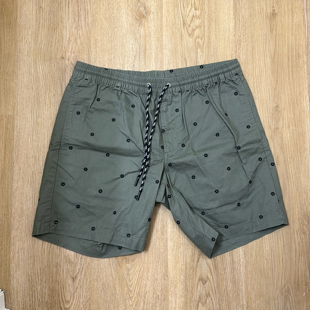 Olive green shorts with pattern